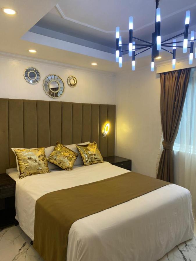 Апартаменты Makati Isabela Luxury Манила Экстерьер фото