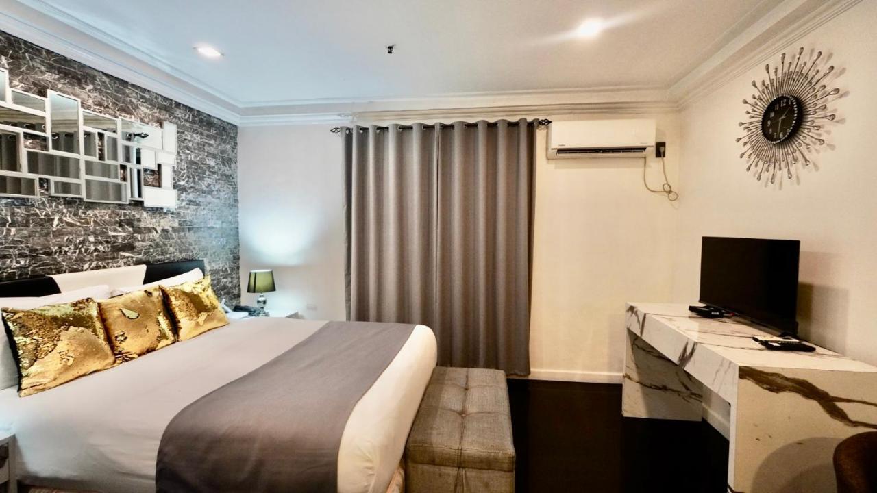 Апартаменты Makati Isabela Luxury Манила Экстерьер фото