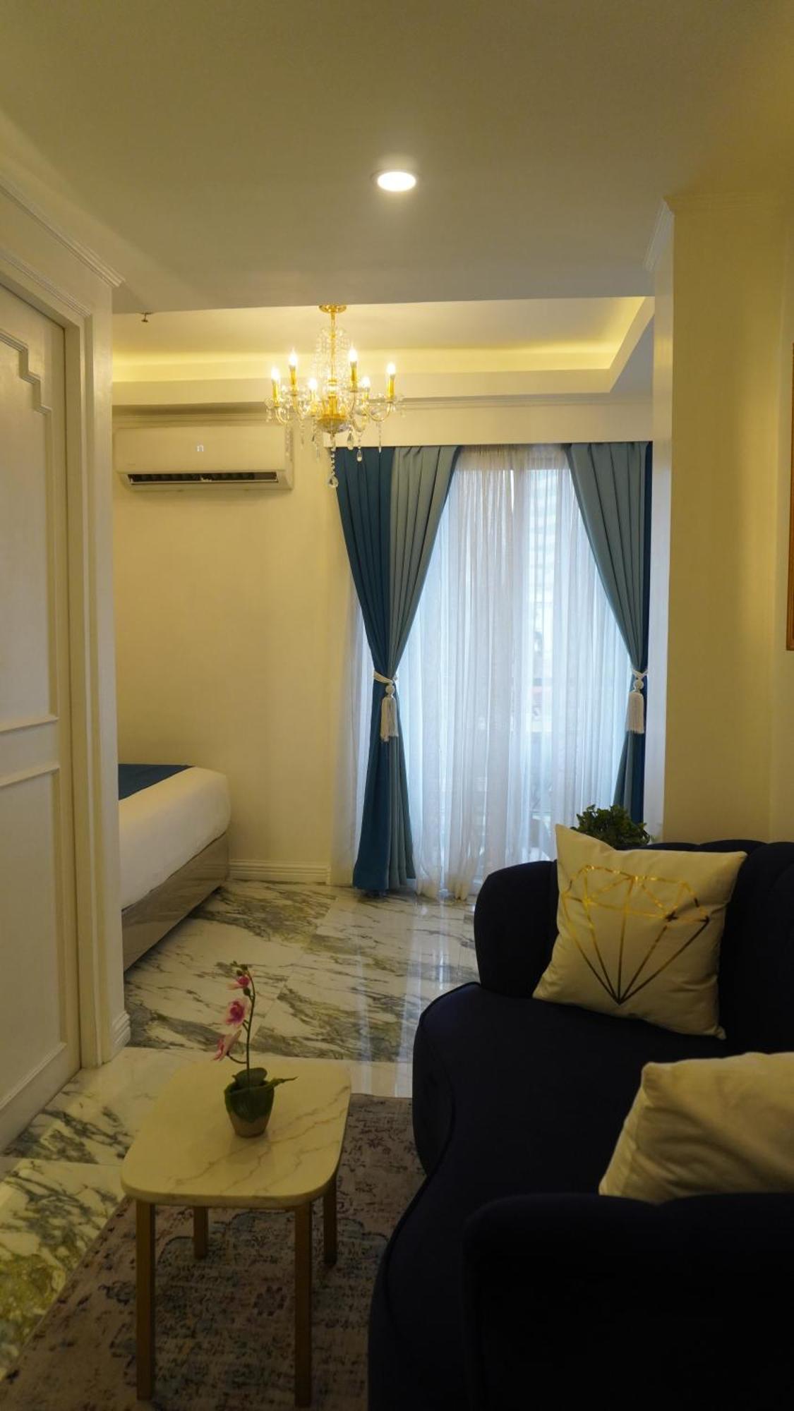 Апартаменты Makati Isabela Luxury Манила Экстерьер фото